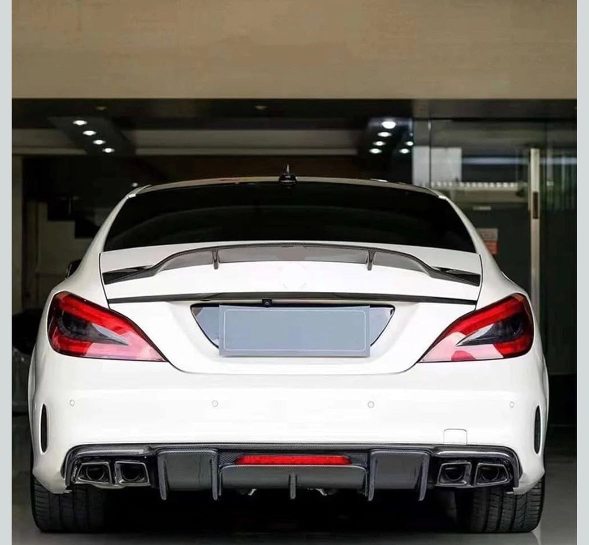 Mercedes W218 CLS 63 AMG Carbon Fiber LED Rear Diffuser